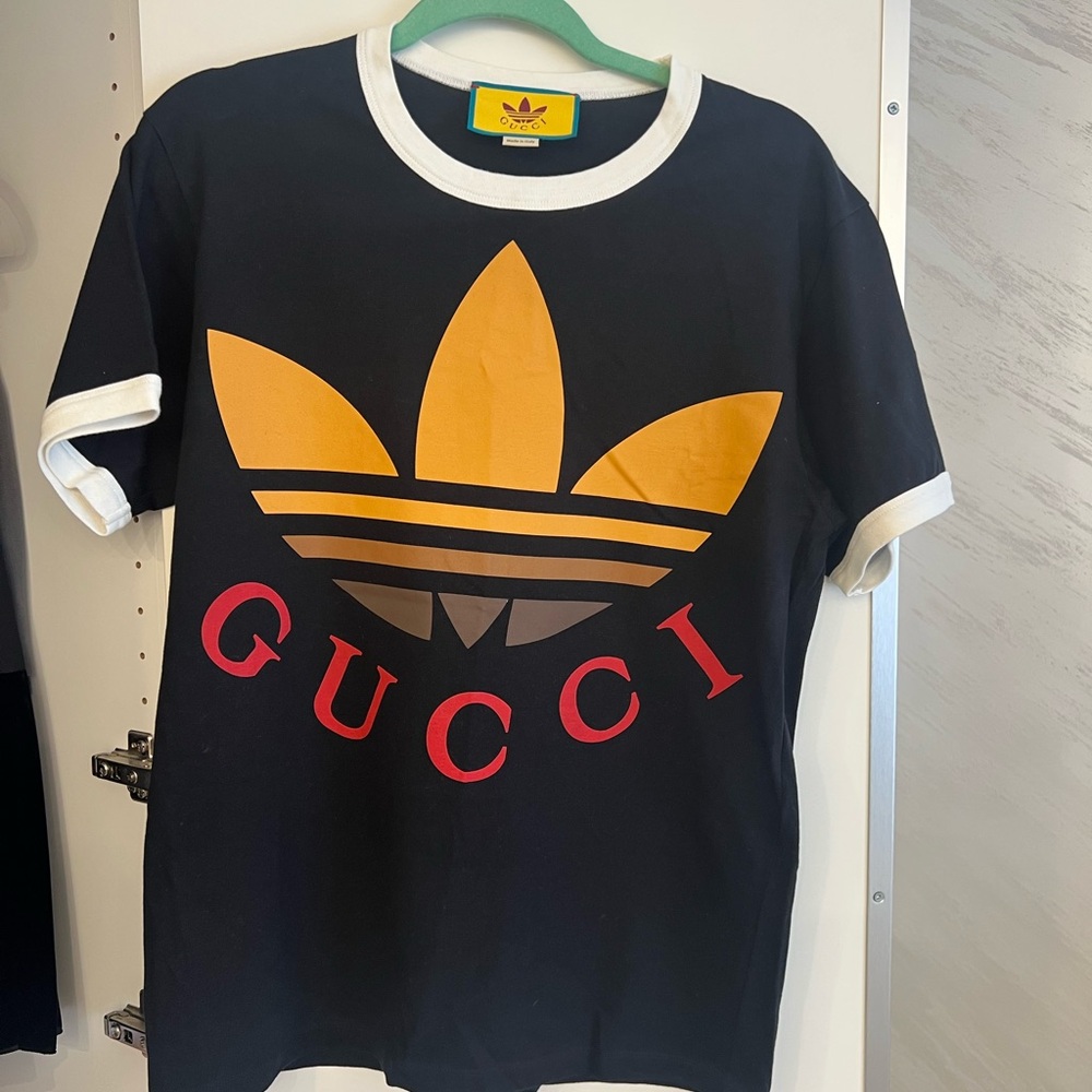 Gucci Black T-Shirt with Gold and Red Logo